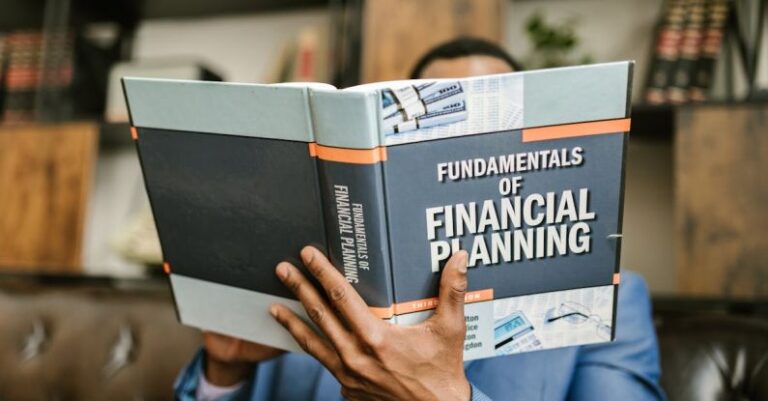 Fundamentals - Person Reading a Book About Fundamentals of Financial Planning