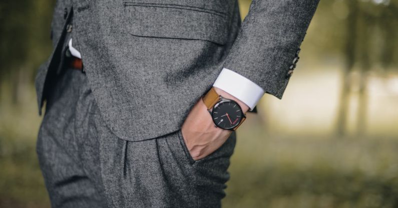Trends - Man Wearing Watch With Hand on Pocket
